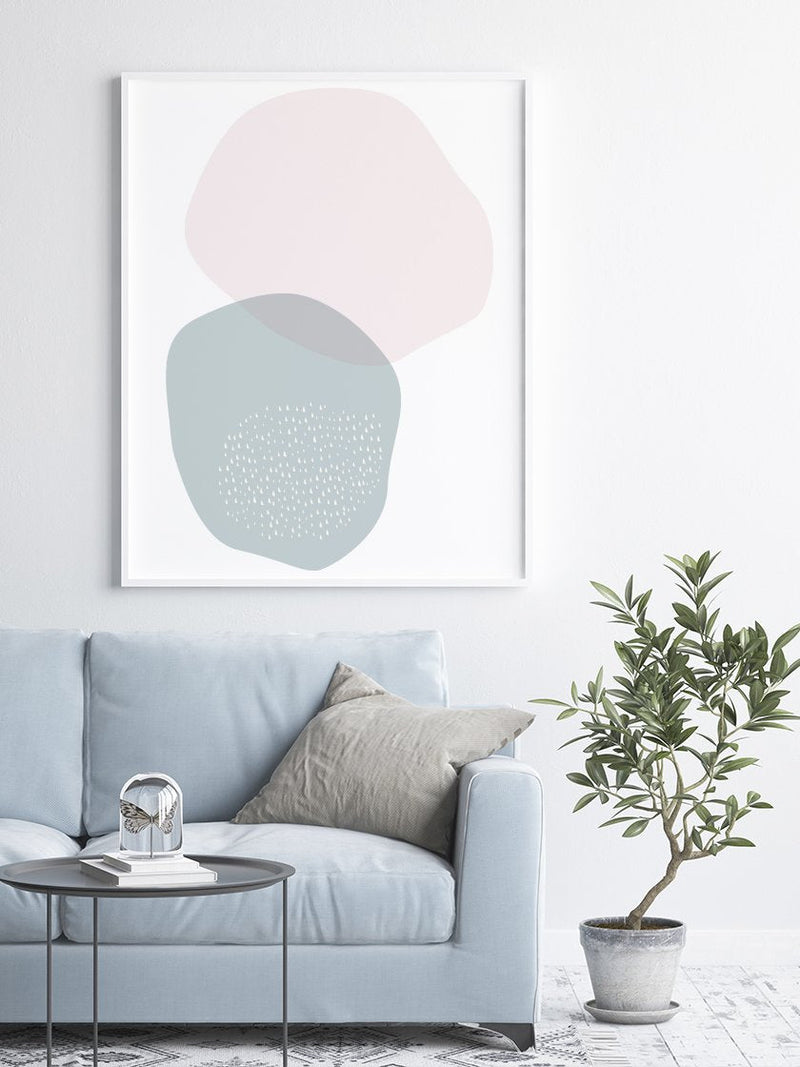 blue-and-pink-circle-pastel-shapes-poster-in-interior-living-room